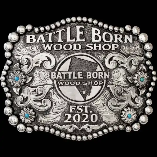 "Our Belmont Belt Buckle is a tribute to pioneers and hard workers, a piece that reflects grit, resilience, and the frontier spirit. This buckle is crafted on a hand-engraved, German Silver base with a light antique finish. The monochromatic design u